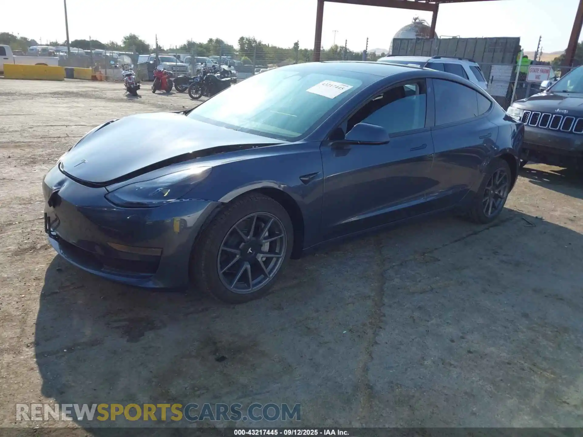 2 fotografías del automóvil dañado 5YJ3E1EA2PF425527 TESLA MODEL 3 2023