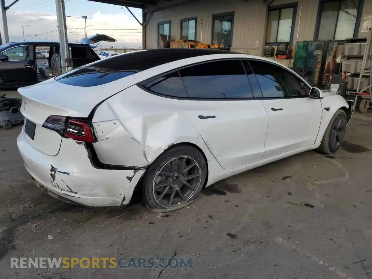 3 Photograph of a damaged car 5YJ3E1EA2PF498123 TESLA MODEL 3 2023
