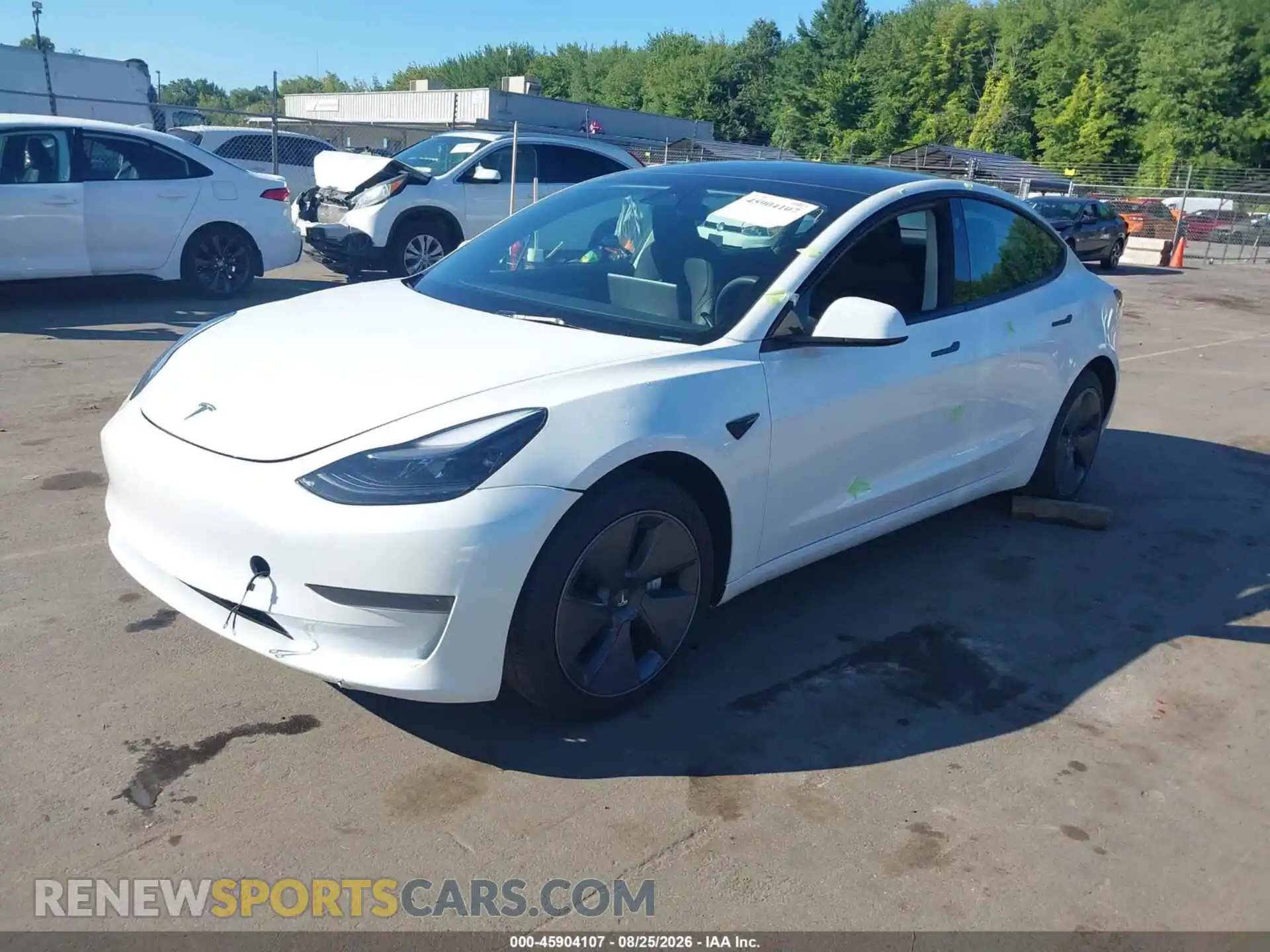 2 fotografías del automóvil dañado 5YJ3E1EA2PF540807 TESLA MODEL 3 2023