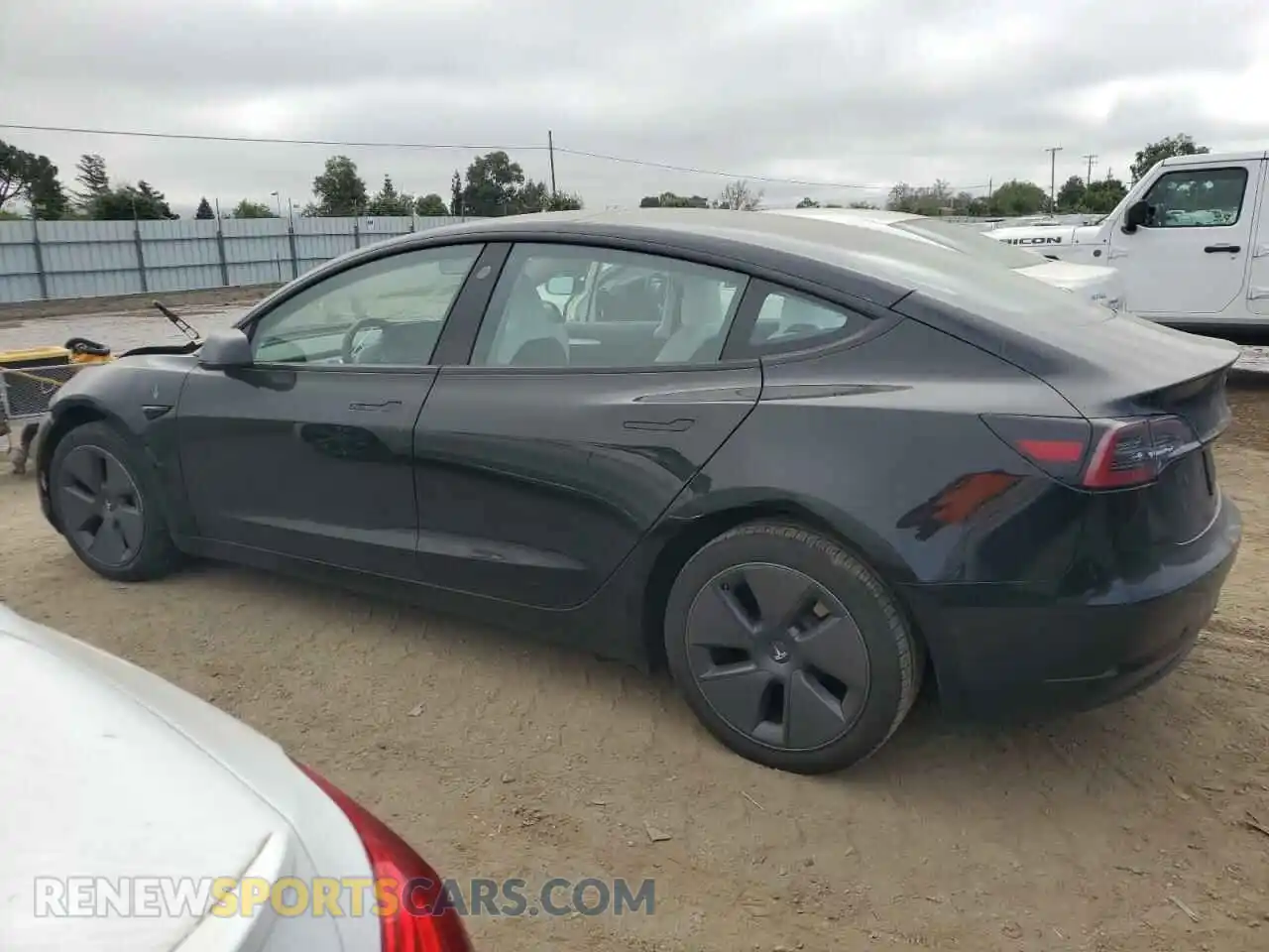 2 fotografías del automóvil dañado 5YJ3E1EA2PF547160 TESLA MODEL 3 2023