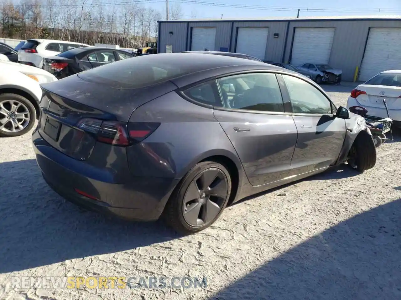 3 fotografías del automóvil dañado 5YJ3E1EA2PF573726 TESLA MODEL 3 2023