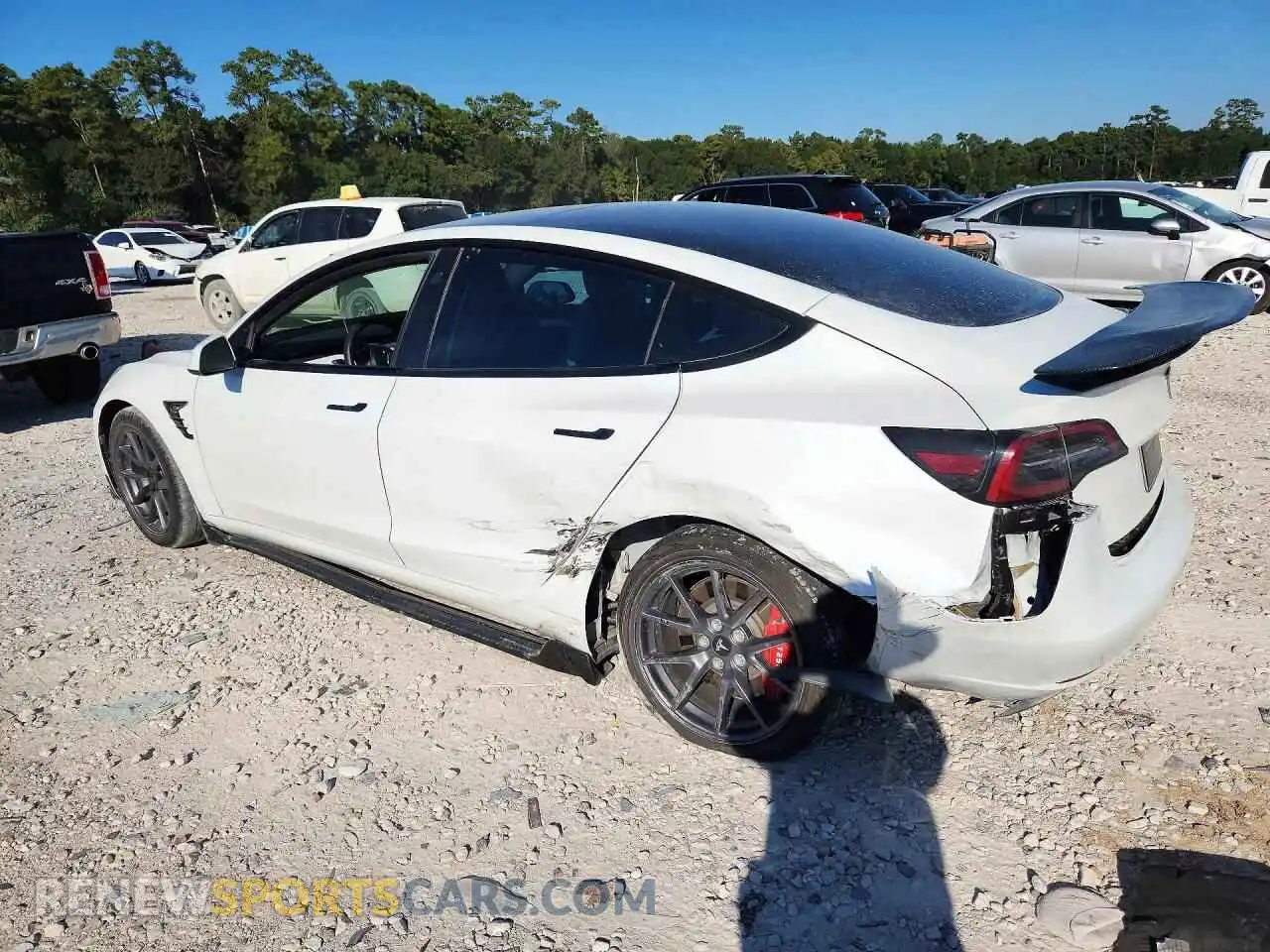 2 fotografías del automóvil dañado 5YJ3E1EA2PF653561 TESLA MODEL 3 2023