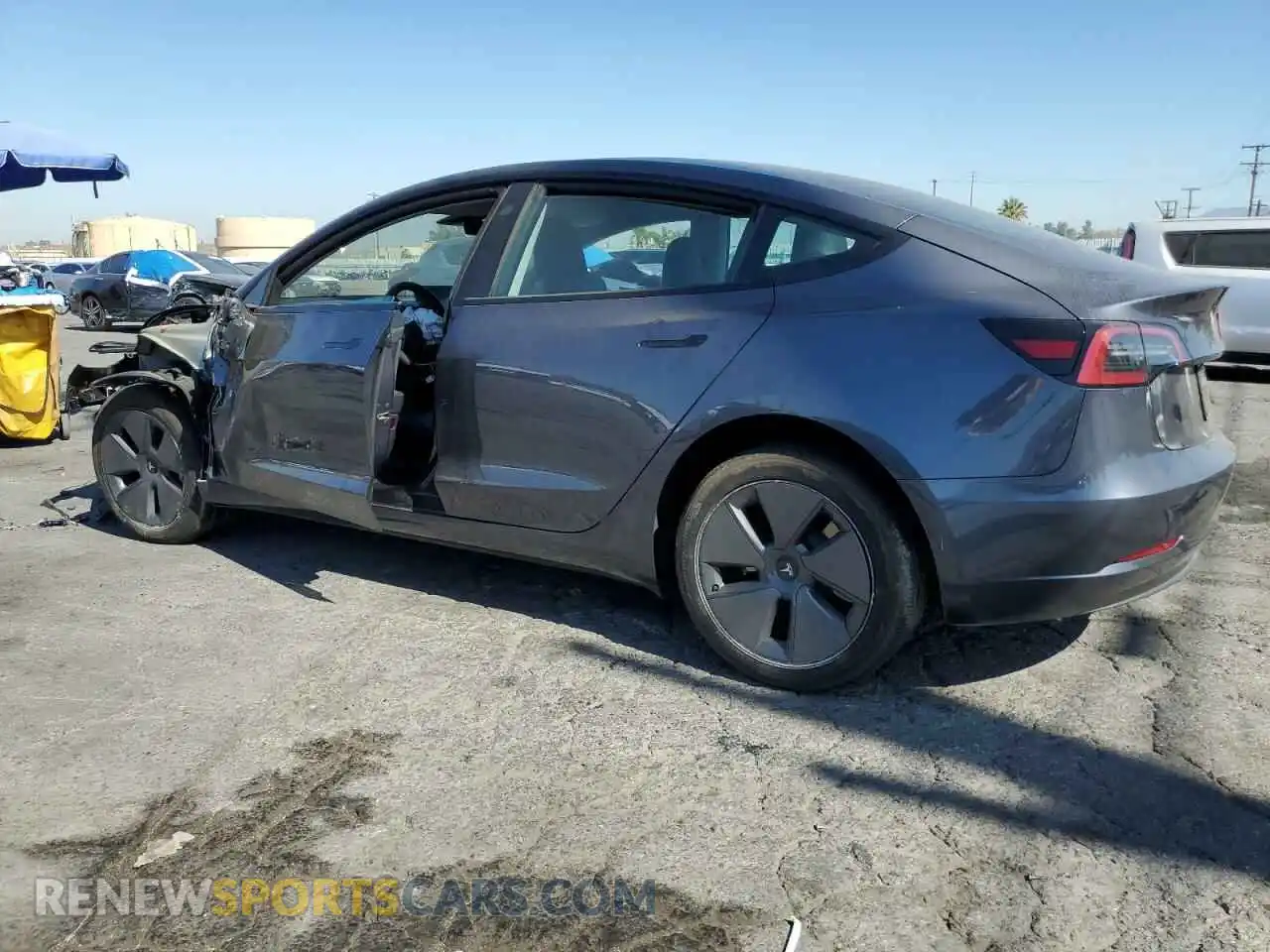 2 Photograph of a damaged car 5YJ3E1EA2PF710468 TESLA MODEL 3 2023