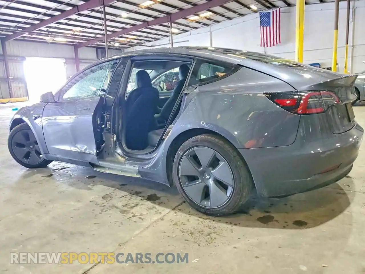 2 fotografías del automóvil dañado 5YJ3E1EA3PF657120 TESLA MODEL 3 2023