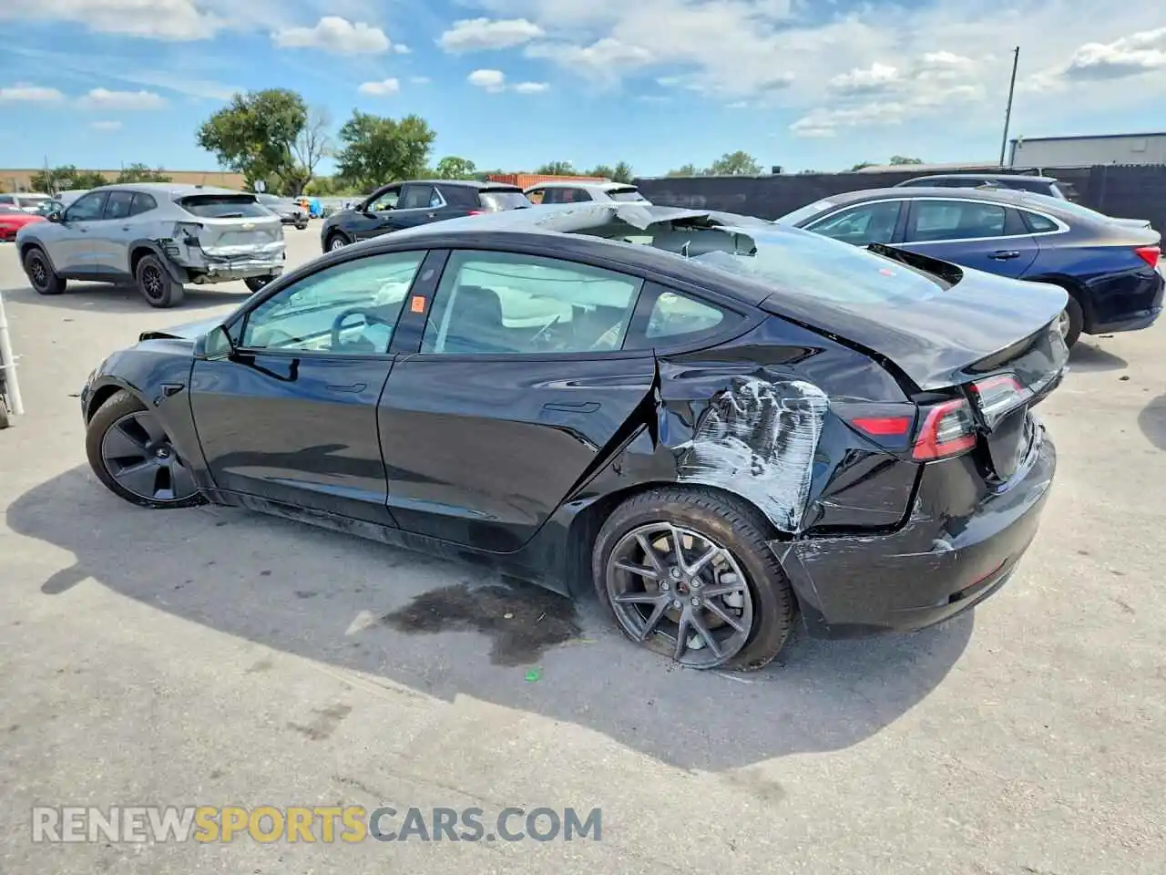 2 fotografías del automóvil dañado 5YJ3E1EA3PF702945 TESLA MODEL 3 2023