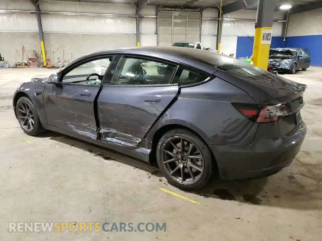 2 Photograph of a damaged car 5YJ3E1EA4PF397102 TESLA MODEL 3 2023