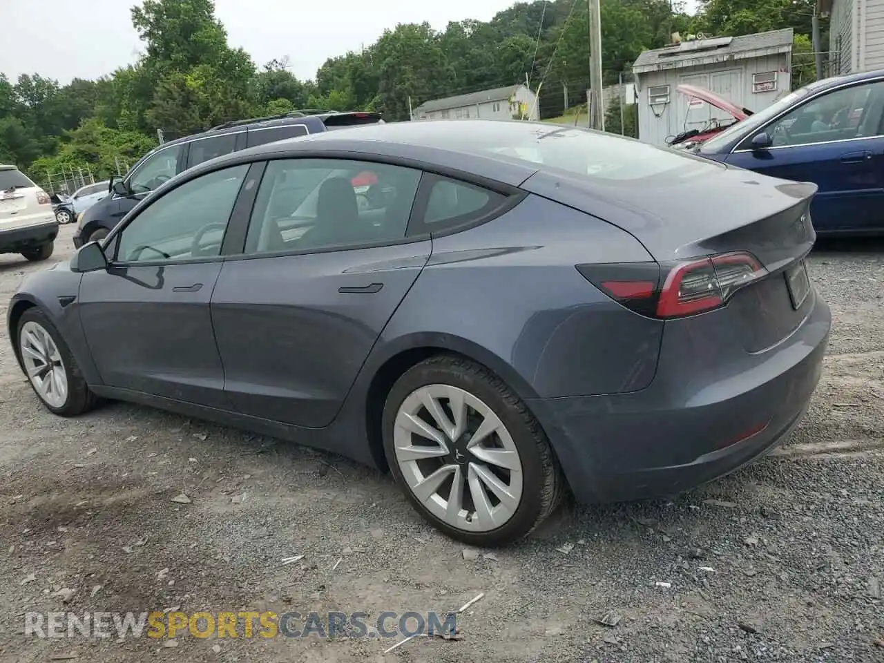 2 fotografías del automóvil dañado 5YJ3E1EA4PF465172 TESLA MODEL 3 2023
