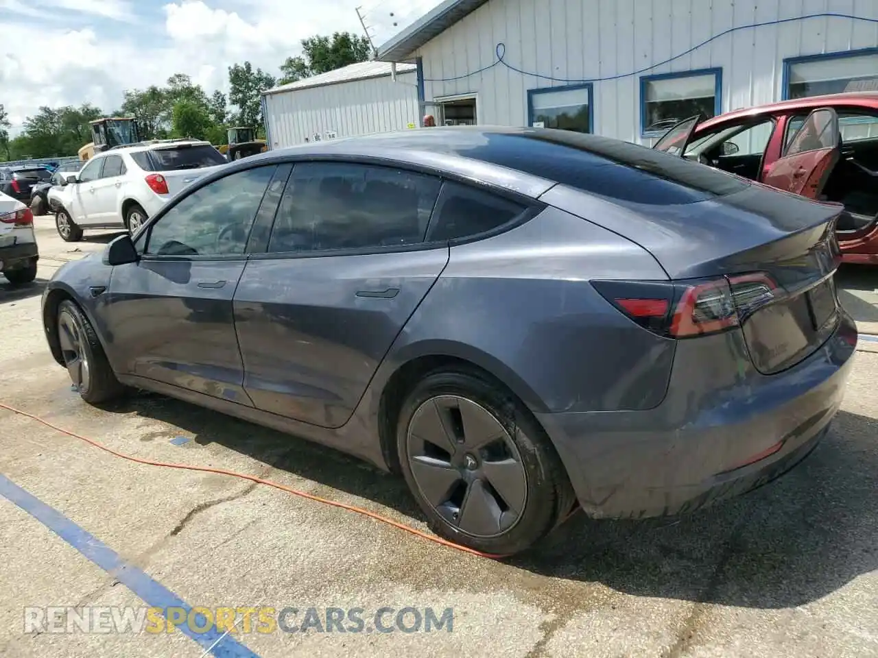 2 Photograph of a damaged car 5YJ3E1EA4PF614129 TESLA MODEL 3 2023