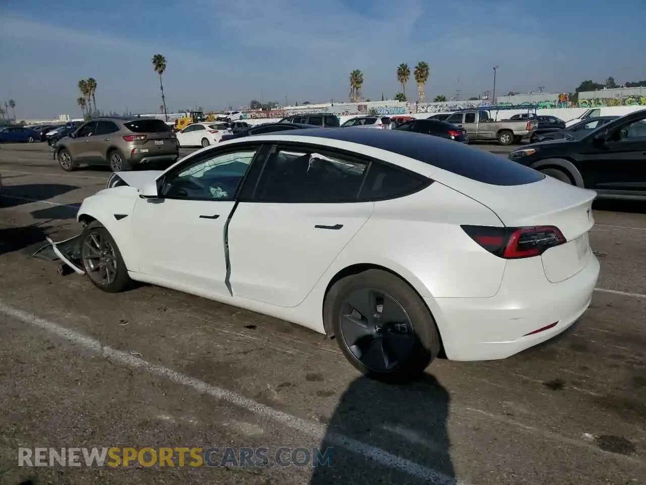 2 fotografías del automóvil dañado 5YJ3E1EA5PF398078 TESLA MODEL 3 2023