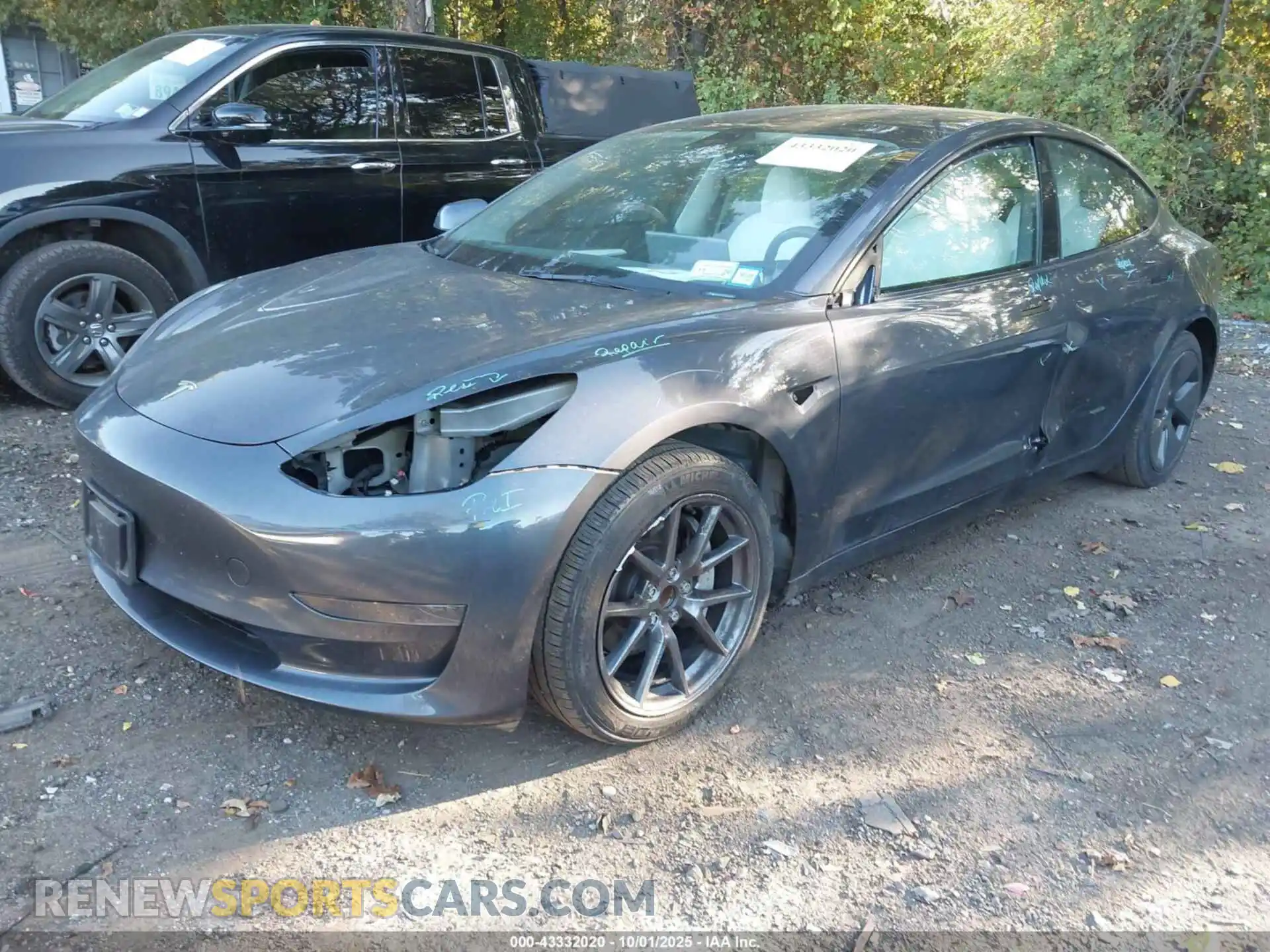 2 Photograph of a damaged car 5YJ3E1EA5PF552224 TESLA MODEL 3 2023