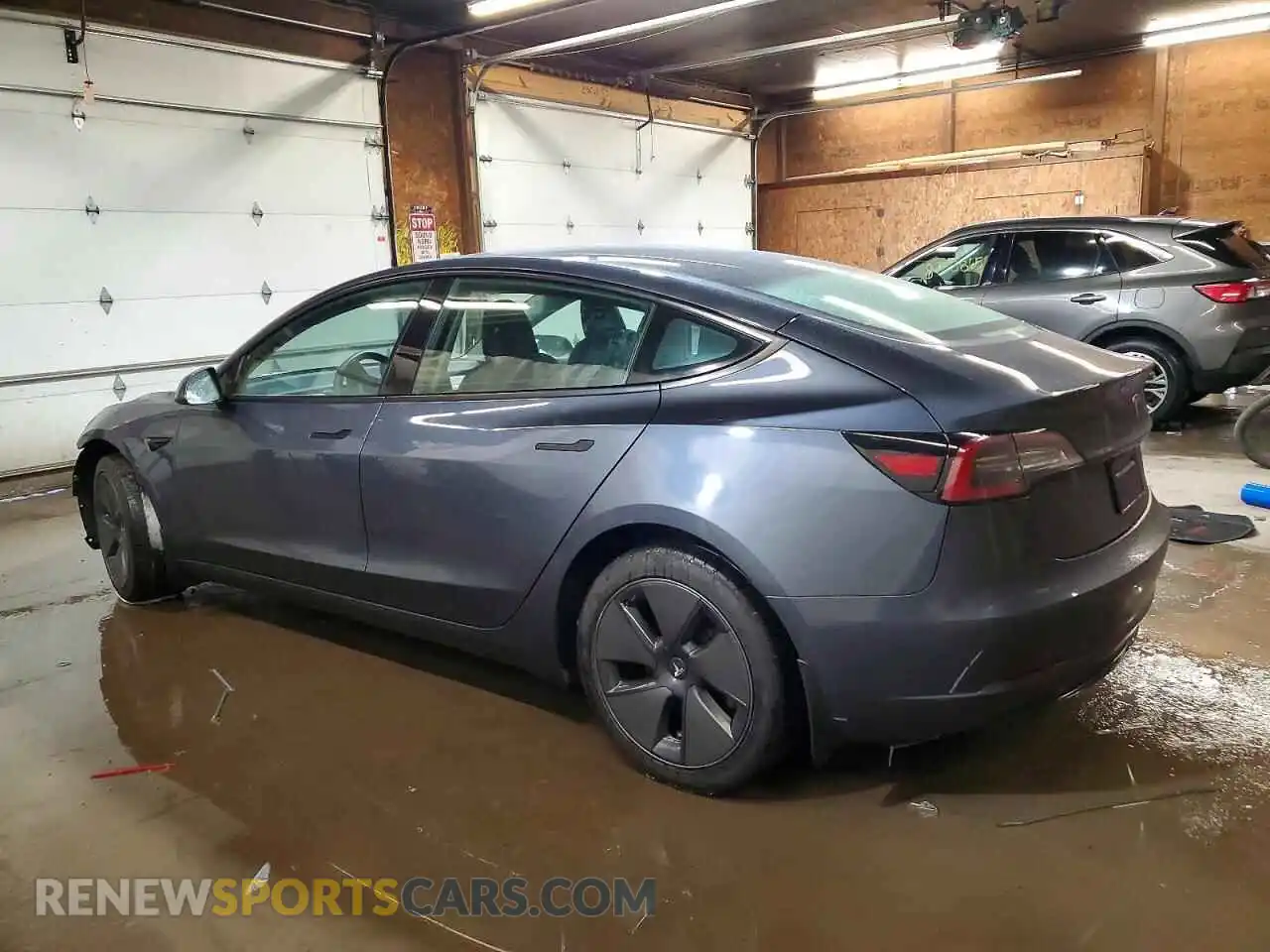 2 Photograph of a damaged car 5YJ3E1EA5PF559304 TESLA MODEL 3 2023