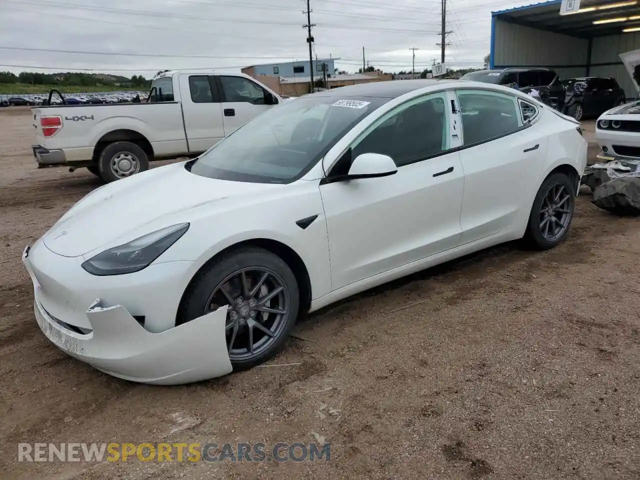 1 Photograph of a damaged car 5YJ3E1EA5PF607075 TESLA MODEL 3 2023