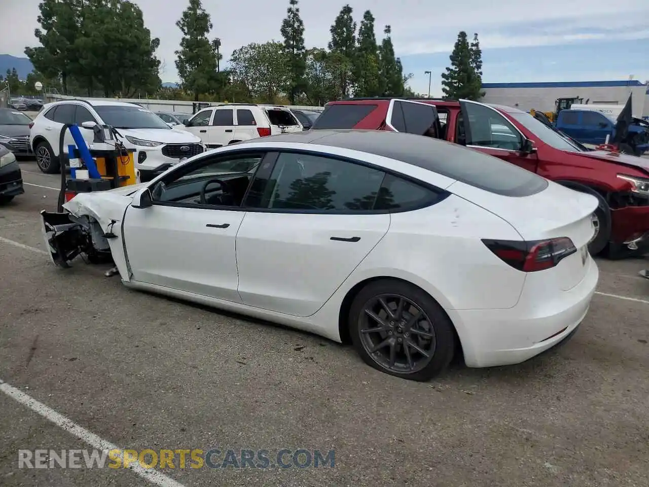 2 Photograph of a damaged car 5YJ3E1EA5PF641291 TESLA MODEL 3 2023