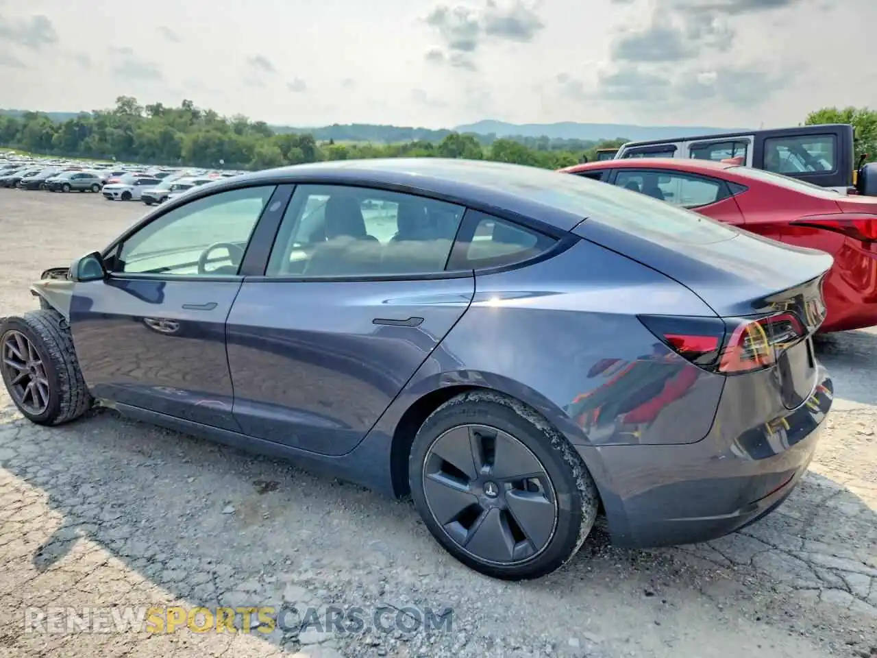 2 fotografías del automóvil dañado 5YJ3E1EA5PF641761 TESLA MODEL 3 2023