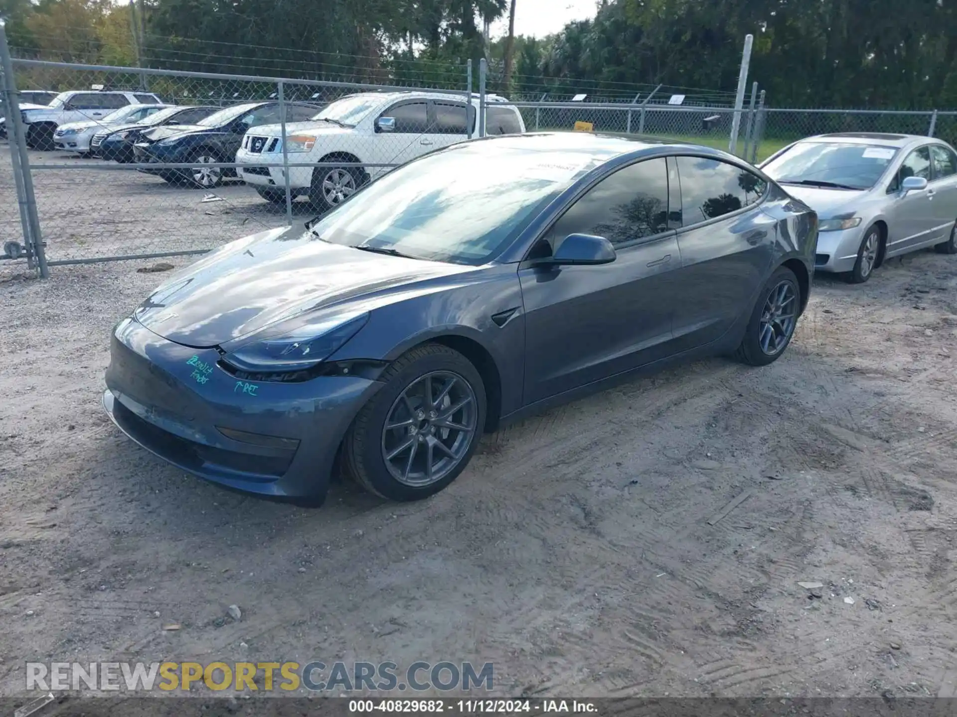 2 Photograph of a damaged car 5YJ3E1EA5PF648404 TESLA MODEL 3 2023