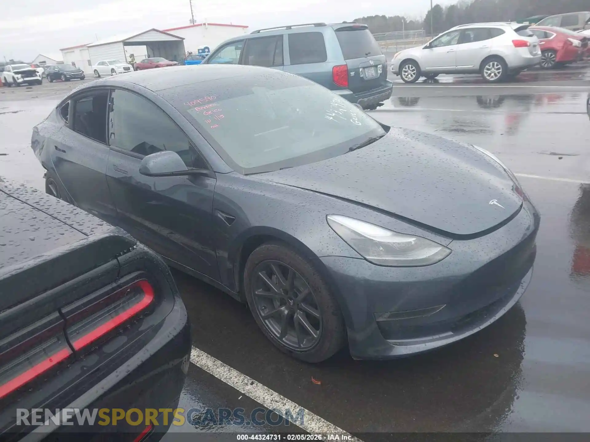 1 Photograph of a damaged car 5YJ3E1EA6PF409590 TESLA MODEL 3 2023