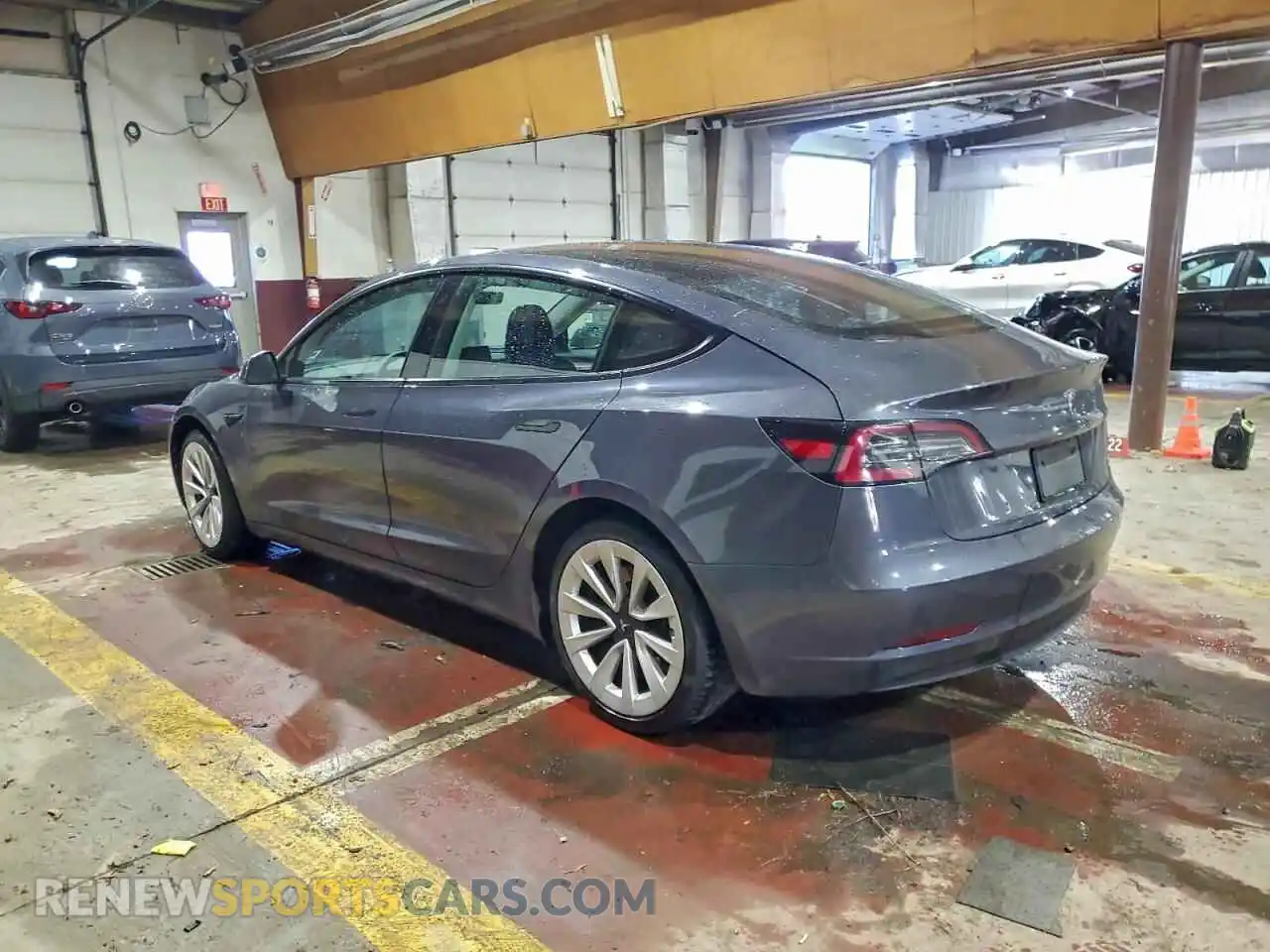 2 fotografías del automóvil dañado 5YJ3E1EA6PF435851 TESLA MODEL 3 2023
