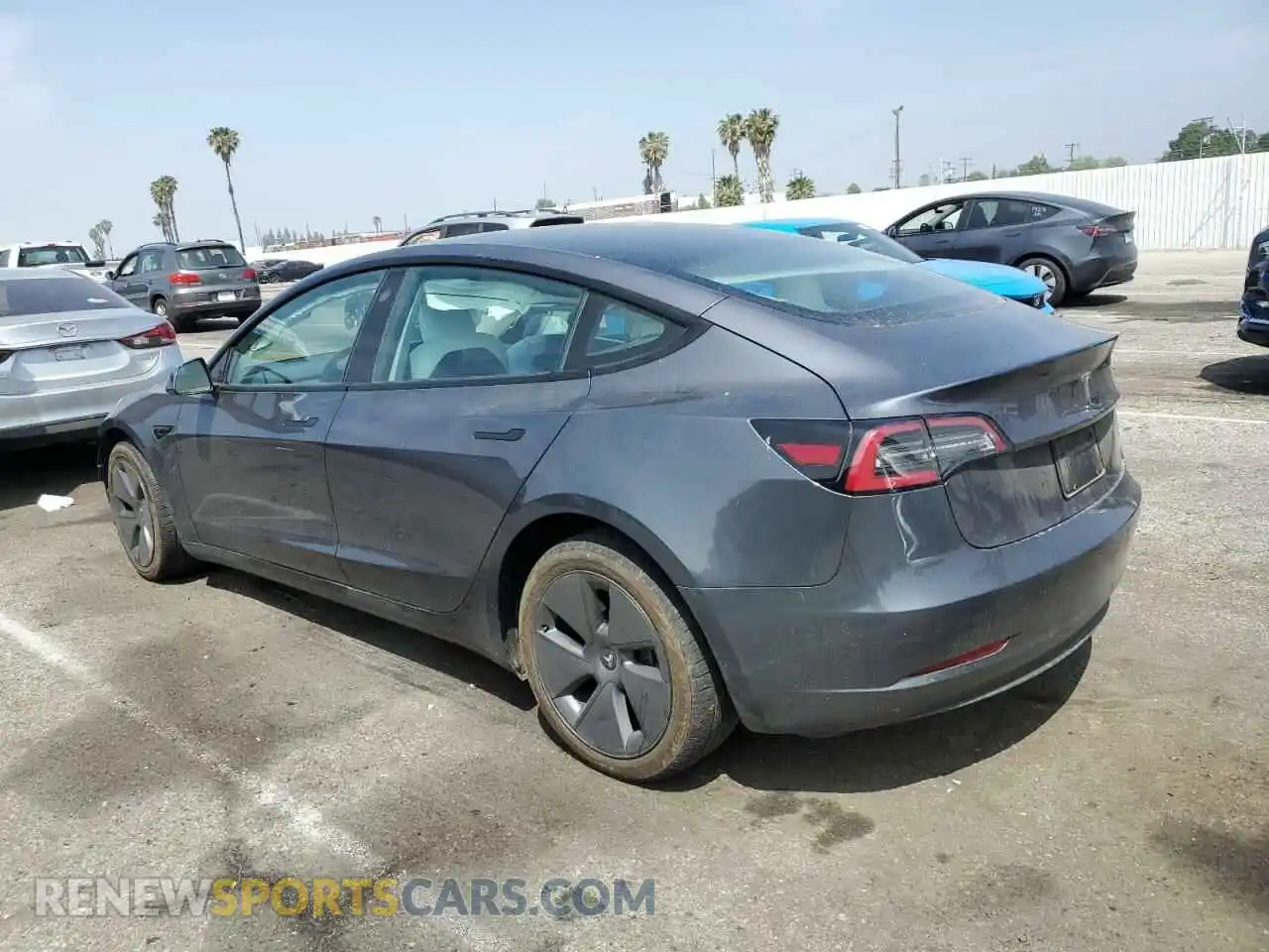 2 Photograph of a damaged car 5YJ3E1EA7PF395103 TESLA MODEL 3 2023