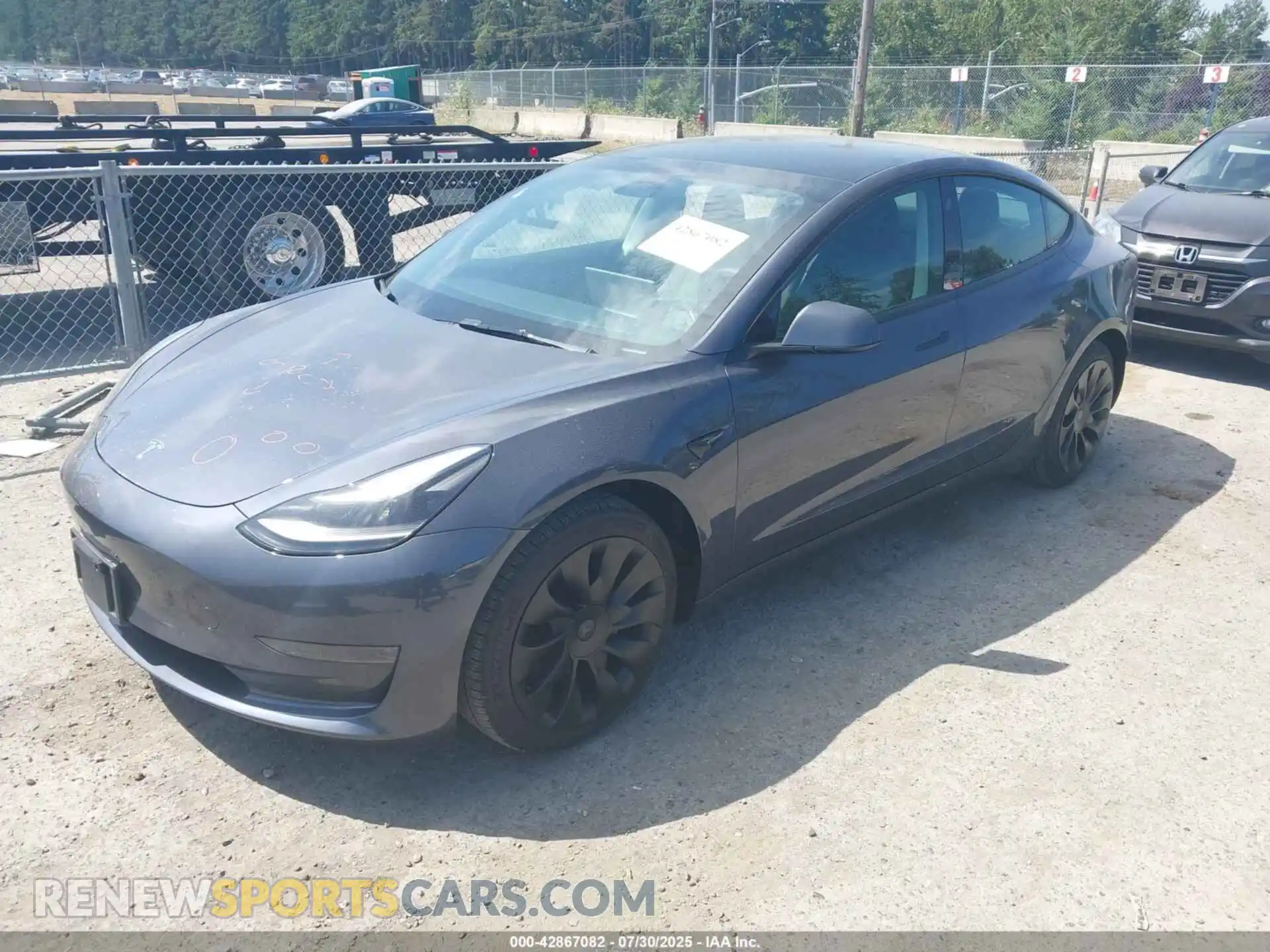 2 Photograph of a damaged car 5YJ3E1EA7PF401563 TESLA MODEL 3 2023