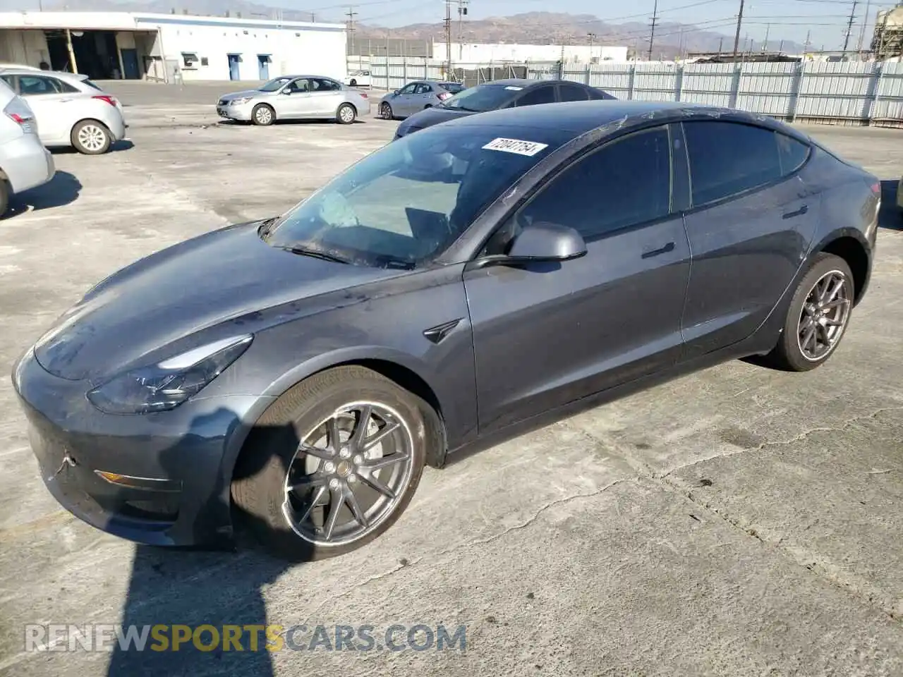 1 Photograph of a damaged car 5YJ3E1EA8PF411034 TESLA MODEL 3 2023