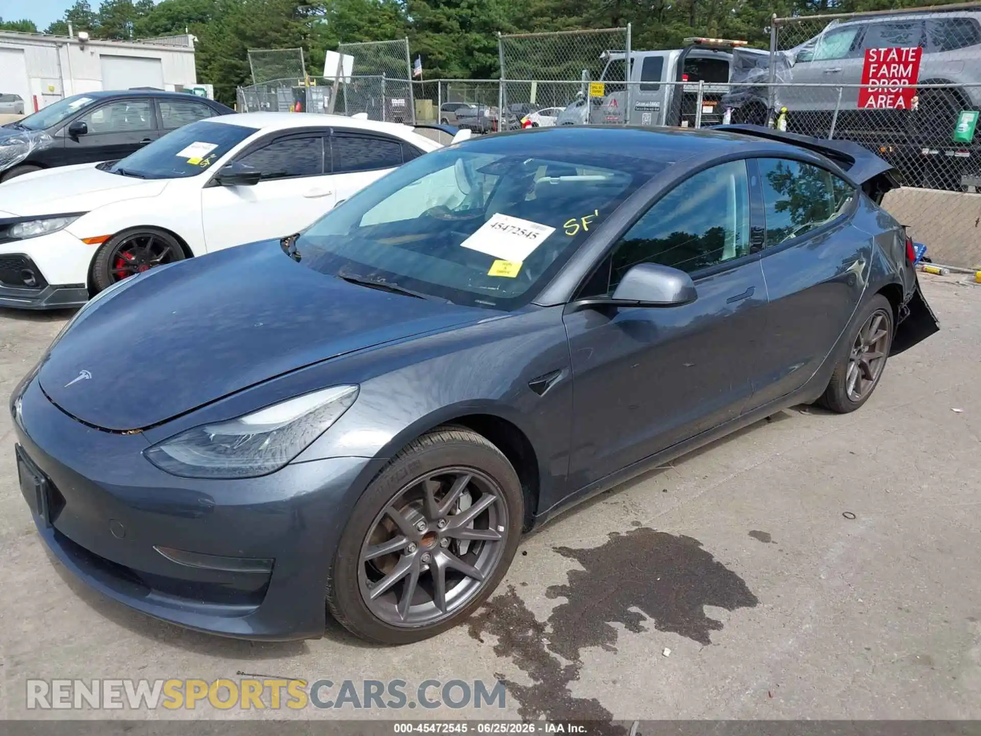 2 fotografías del automóvil dañado 5YJ3E1EA8PF425872 TESLA MODEL 3 2023