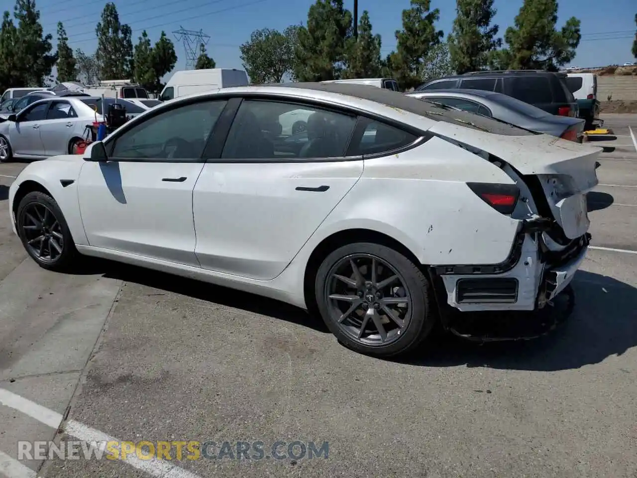 2 Photograph of a damaged car 5YJ3E1EA8PF517449 TESLA MODEL 3 2023