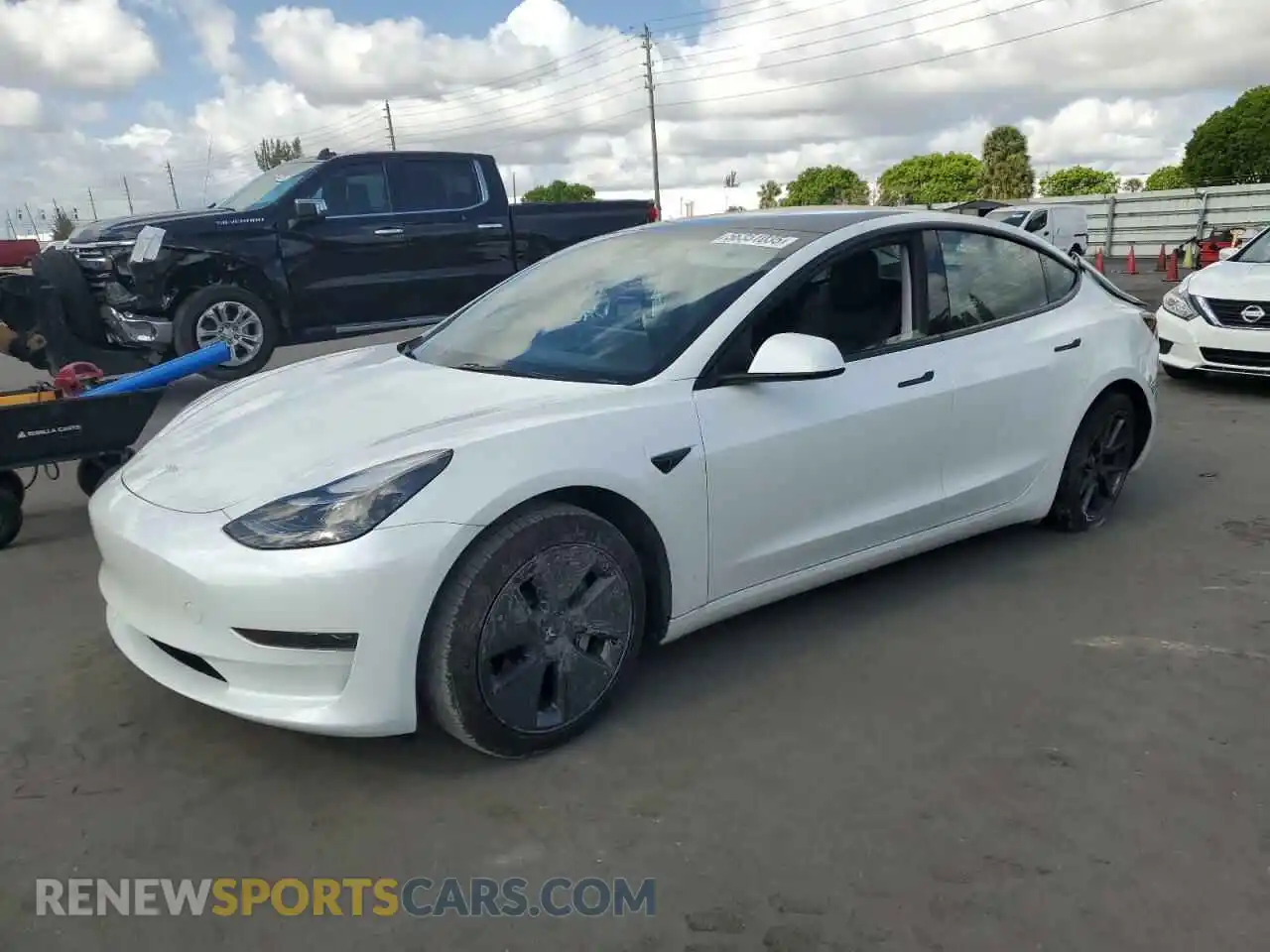 1 Photograph of a damaged car 5YJ3E1EA8PF553061 TESLA MODEL 3 2023