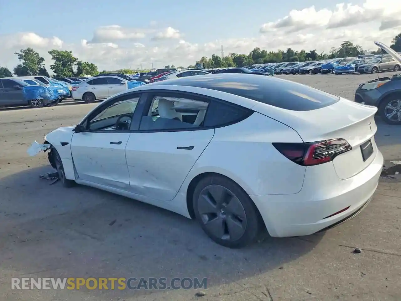 2 fotografías del automóvil dañado 5YJ3E1EA8PF573116 TESLA MODEL 3 2023