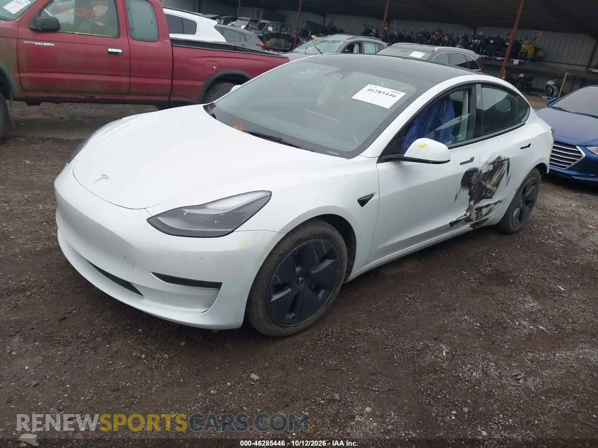 2 Photograph of a damaged car 5YJ3E1EA8PF606275 TESLA MODEL 3 2023