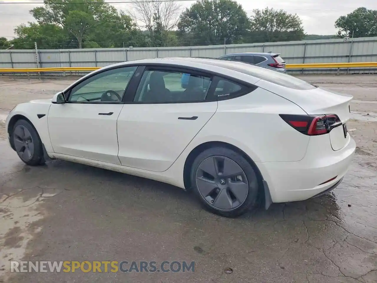 2 Photograph of a damaged car 5YJ3E1EA8PF611802 TESLA MODEL 3 2023