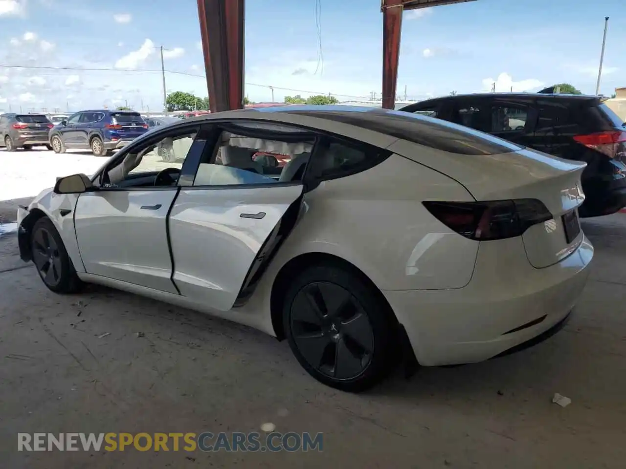 2 Photograph of a damaged car 5YJ3E1EA8PF614568 TESLA MODEL 3 2023