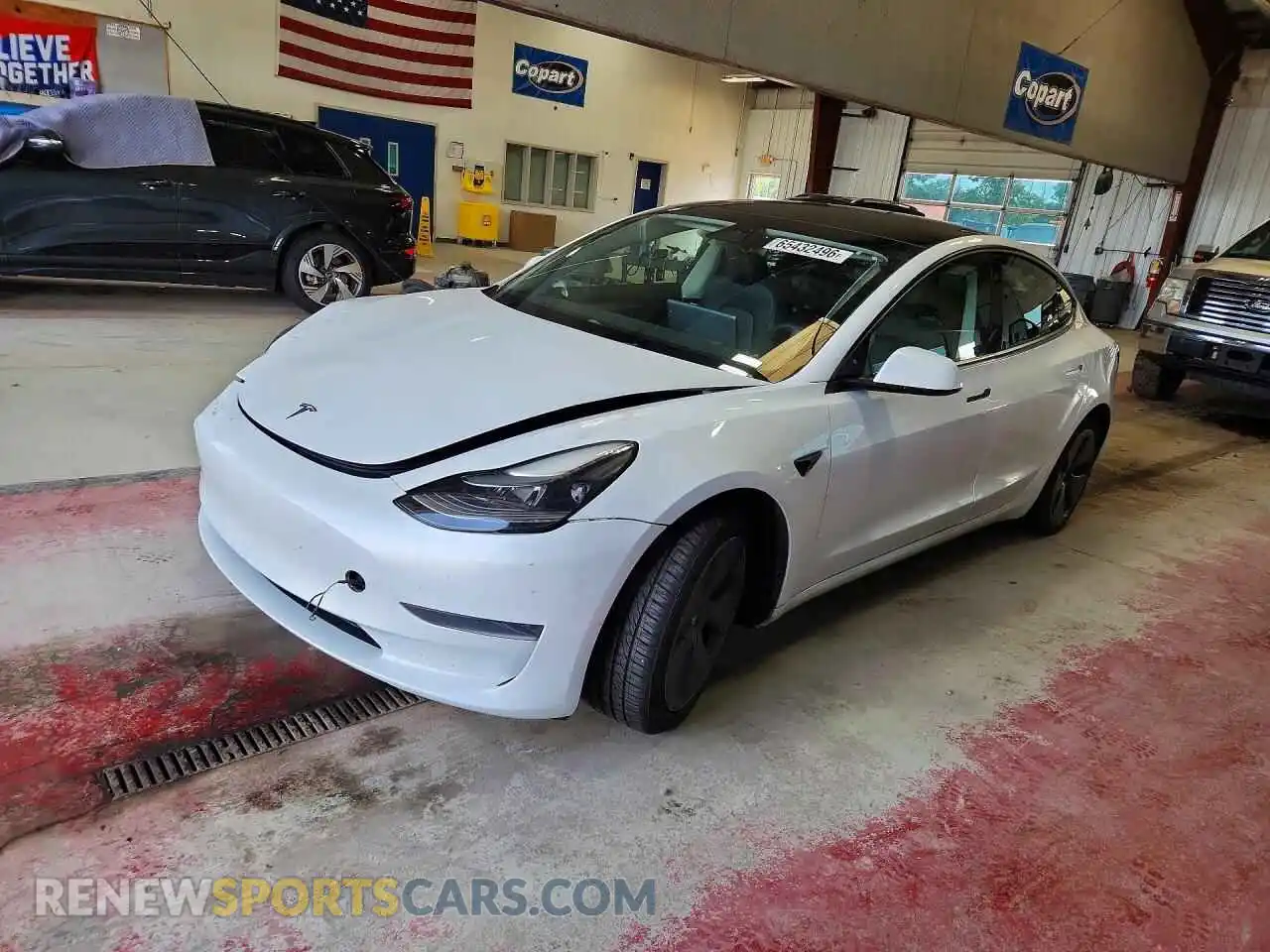 1 Photograph of a damaged car 5YJ3E1EA9PF498698 TESLA MODEL 3 2023