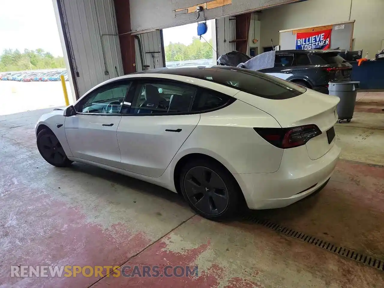 2 Photograph of a damaged car 5YJ3E1EA9PF498698 TESLA MODEL 3 2023