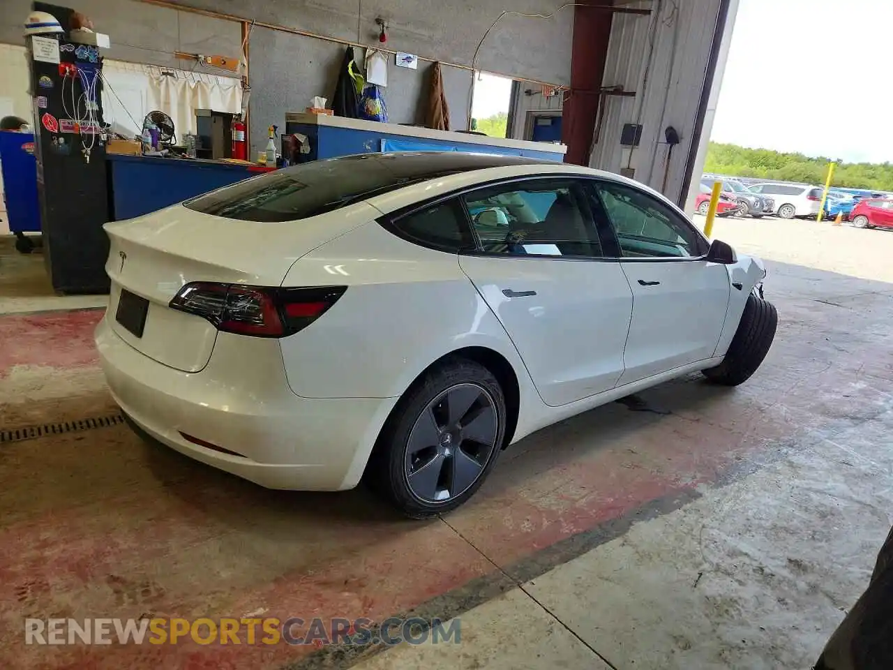 3 Photograph of a damaged car 5YJ3E1EA9PF498698 TESLA MODEL 3 2023