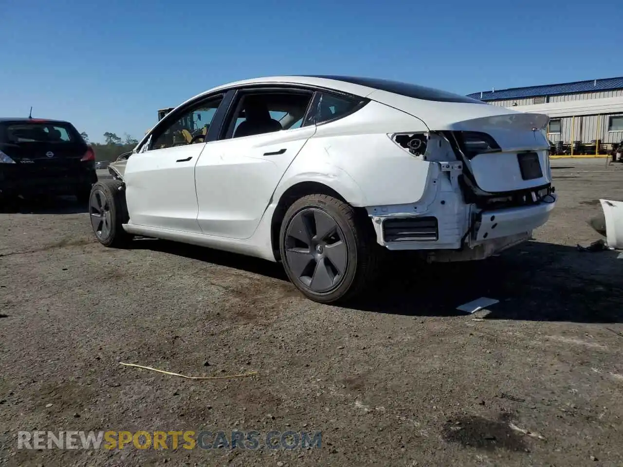 2 Photograph of a damaged car 5YJ3E1EA9PF685701 TESLA MODEL 3 2023