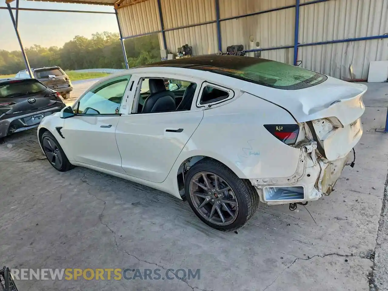 2 fotografías del automóvil dañado 5YJ3E1EAXPF399758 TESLA MODEL 3 2023