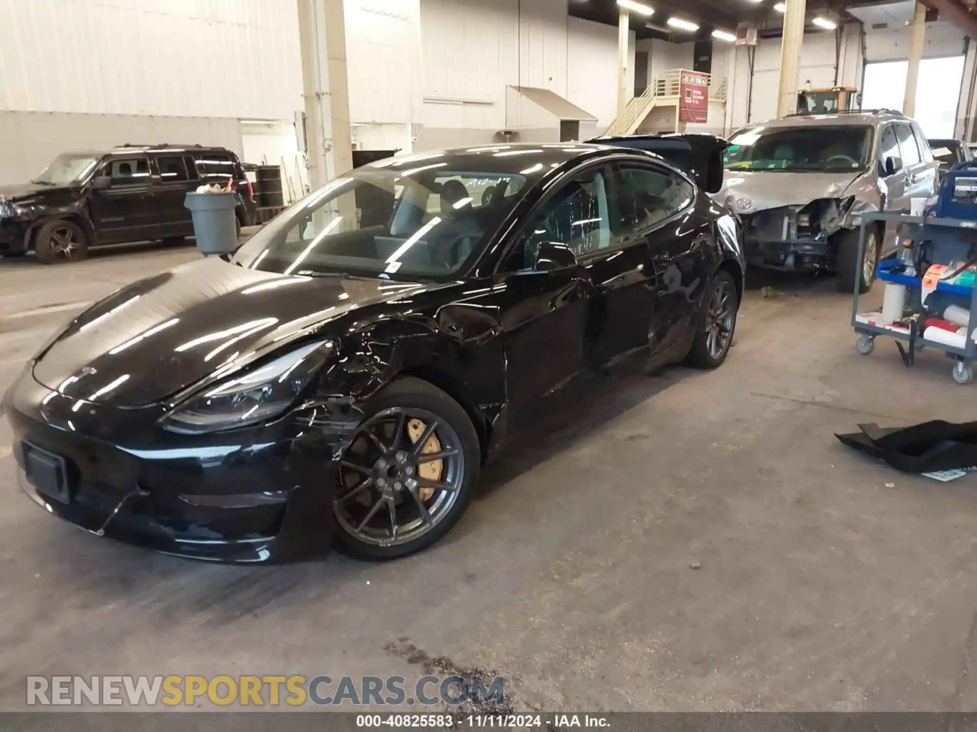 2 Photograph of a damaged car 5YJ3E1EAXPF518389 TESLA MODEL 3 2023