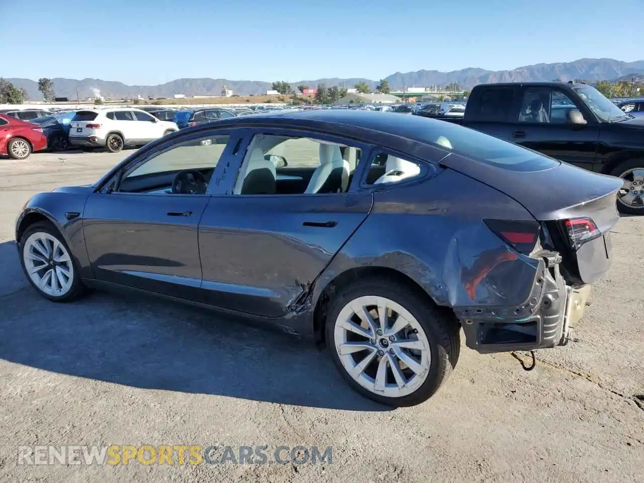 2 Photograph of a damaged car 5YJ3E1EAXPF585395 TESLA MODEL 3 2023