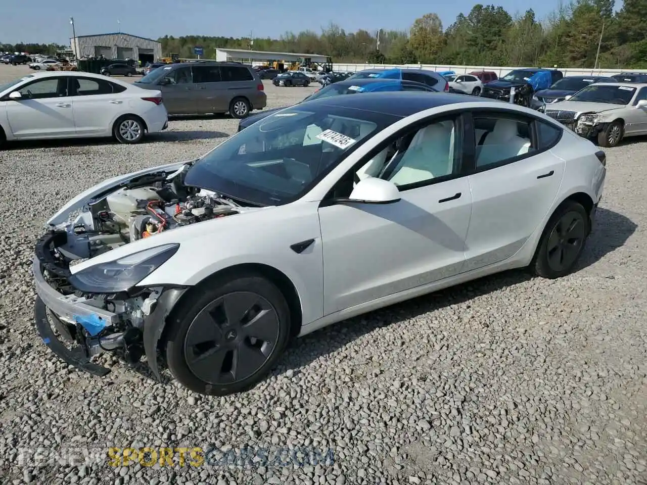 1 Photograph of a damaged car 5YJ3E1EB0PF593188 TESLA MODEL 3 2023