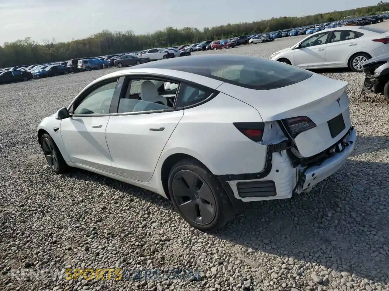 2 Photograph of a damaged car 5YJ3E1EB0PF593188 TESLA MODEL 3 2023