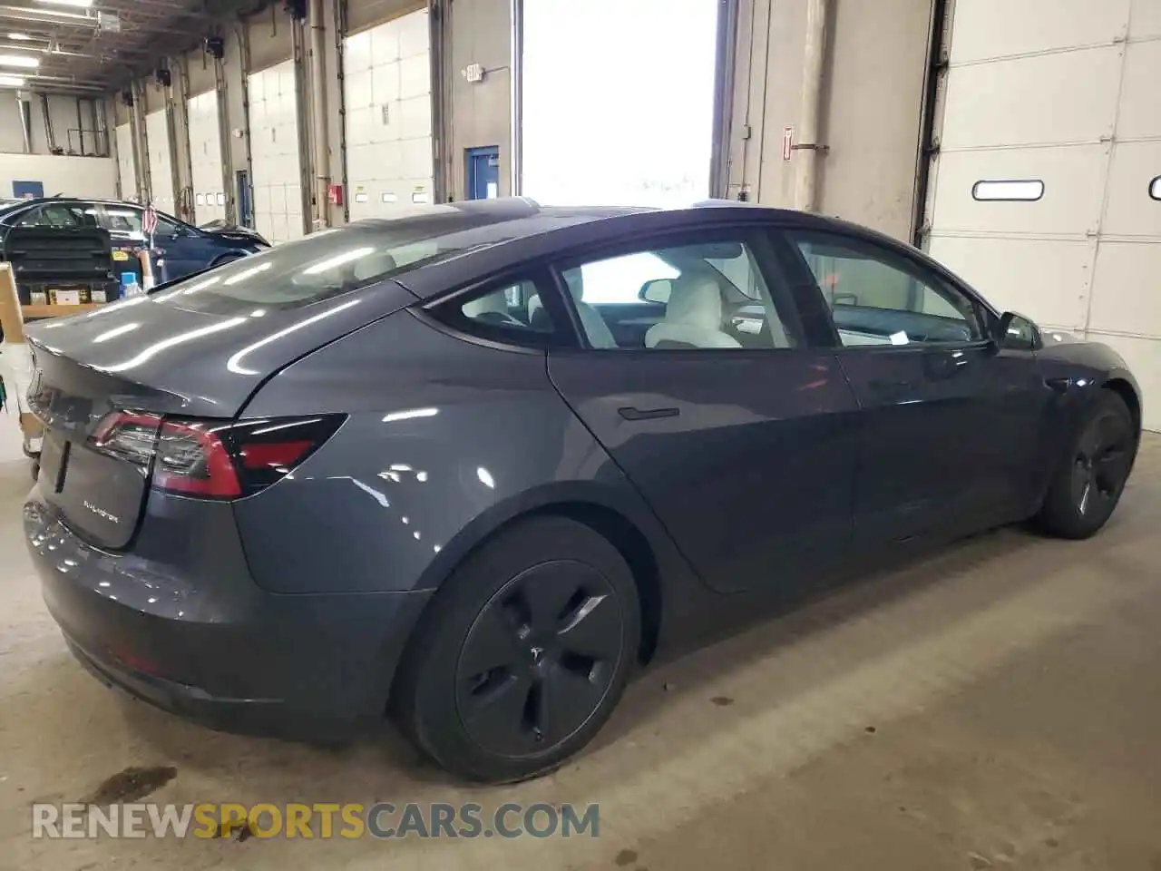3 Photograph of a damaged car 5YJ3E1EB0PF632698 TESLA MODEL 3 2023