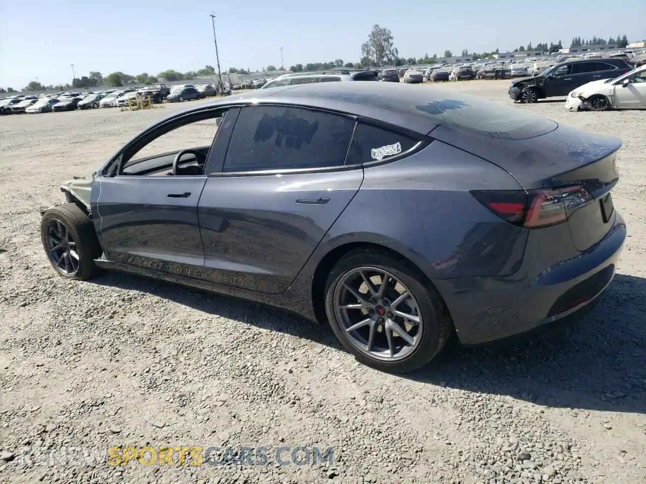2 fotografías del automóvil dañado 5YJ3E1EB0PF636721 TESLA MODEL 3 2023