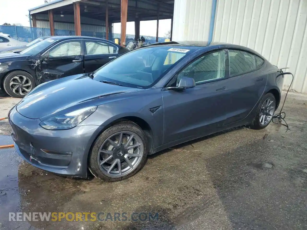 1 Photograph of a damaged car 5YJ3E1EB1PF664821 TESLA MODEL 3 2023