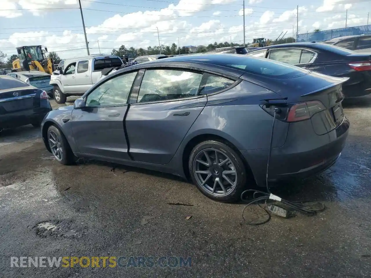 2 Photograph of a damaged car 5YJ3E1EB1PF664821 TESLA MODEL 3 2023