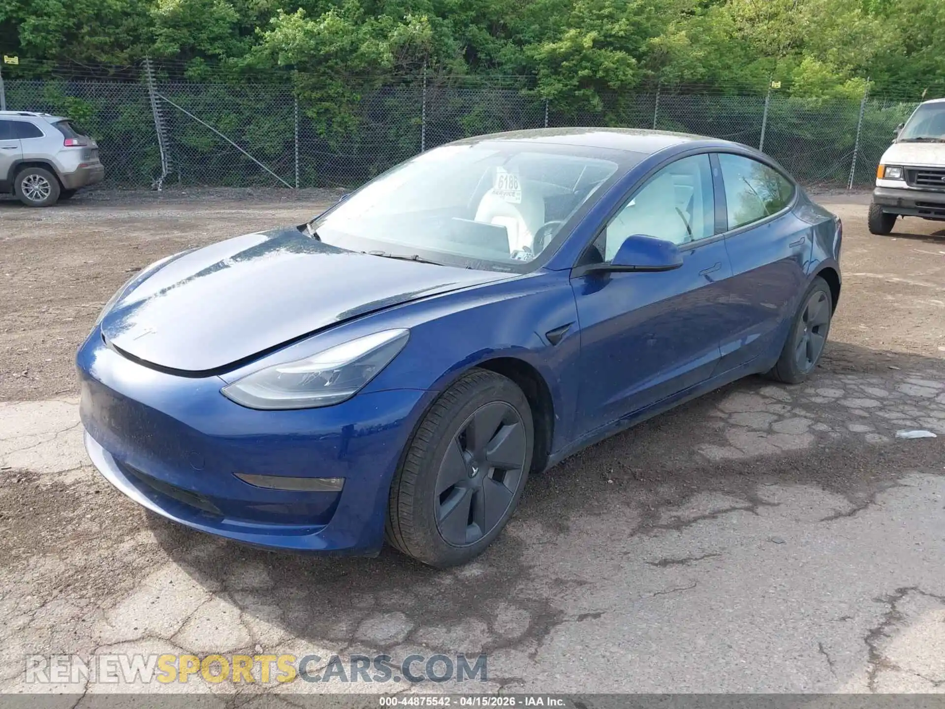 2 Photograph of a damaged car 5YJ3E1EB2PF615403 TESLA MODEL 3 2023