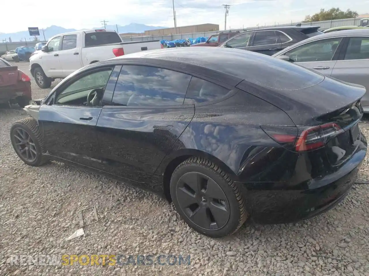 2 fotografías del automóvil dañado 5YJ3E1EB3PF594402 TESLA MODEL 3 2023