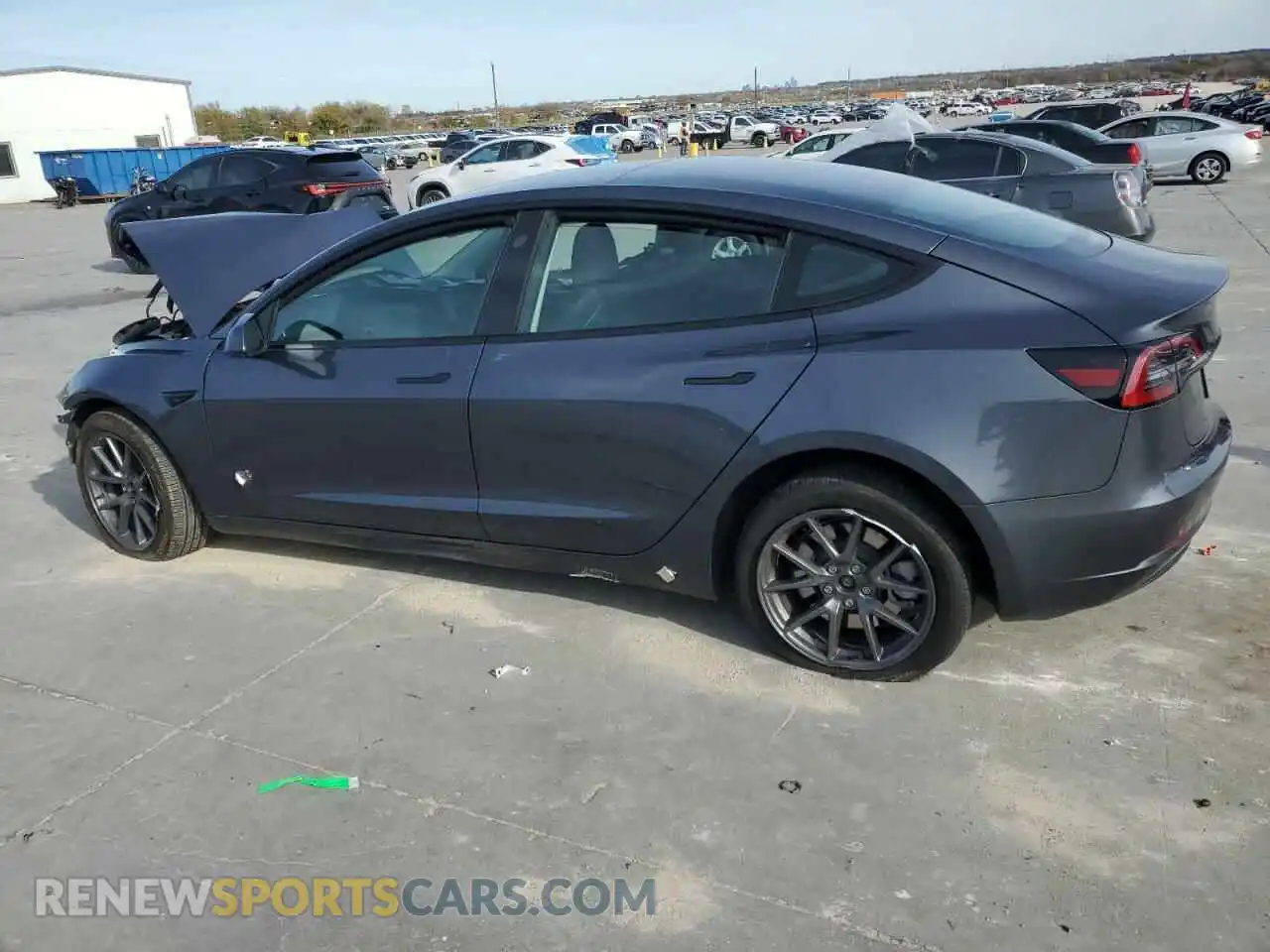 2 Photograph of a damaged car 5YJ3E1EB4PF665896 TESLA MODEL 3 2023