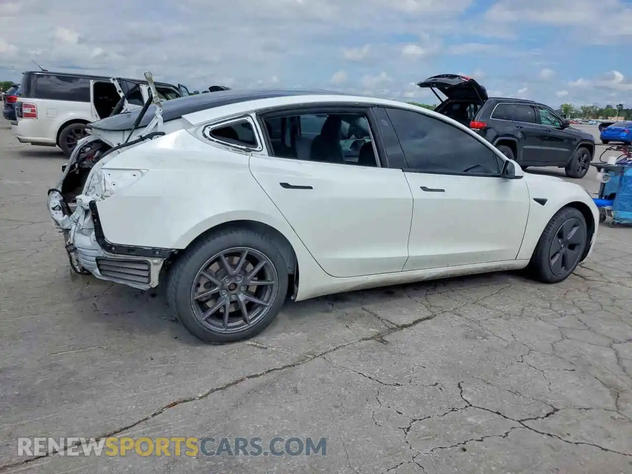 3 Photograph of a damaged car 5YJ3E1EB5PF388143 TESLA MODEL 3 2023