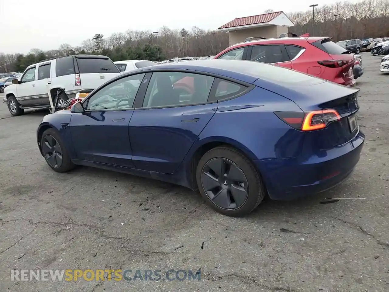 2 Photograph of a damaged car 5YJ3E1EB5PF390099 TESLA MODEL 3 2023