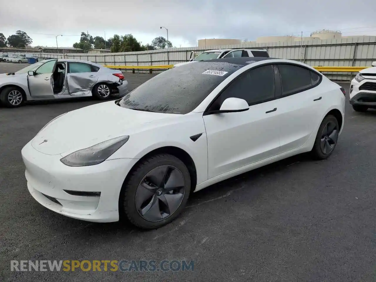 1 Photograph of a damaged car 5YJ3E1EB5PF477825 TESLA MODEL 3 2023